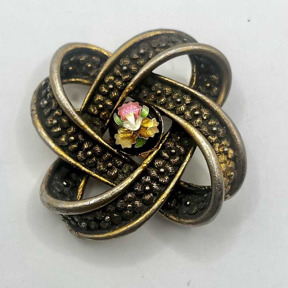 Vintage Gold Tone Interwoven Knot Brooch with Enameled Floral Cabochon